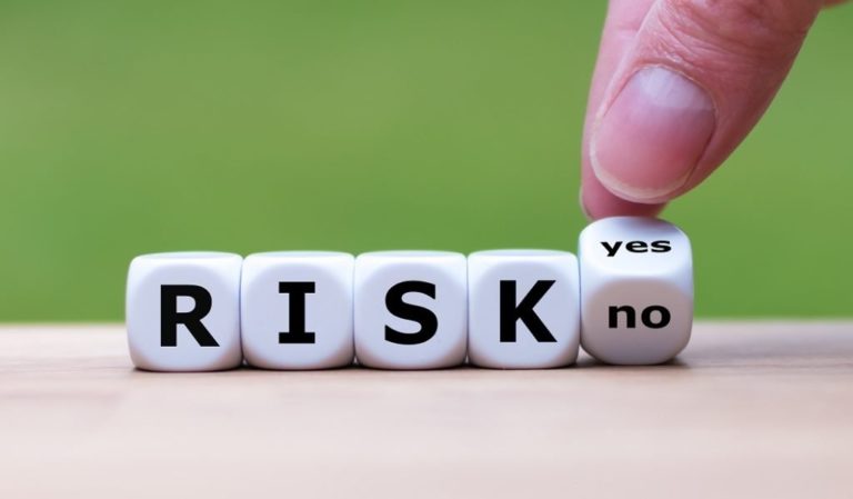 this image shows a man choosing between risk-yes or risk-no